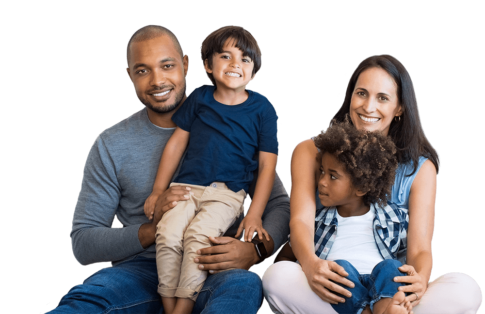 Family of four sitting together smiling